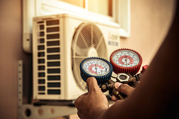 Professional Ac Installation technician working in Mannsville, KY